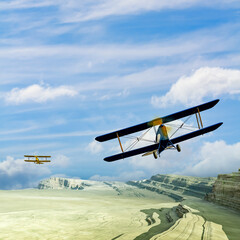 Two vintage biplane airplanes fly over a magnificent mountain top landscape. Big sky room for text © Bob Orsillo