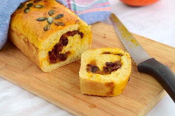 Pumpkin loaf bread with pumpkin seeds and raisin cinnamon sugar filling