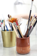 Artist's brushes in a Jar