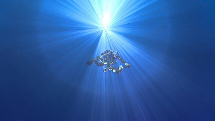 Scuba diver in magic light in the deep blue ocean.