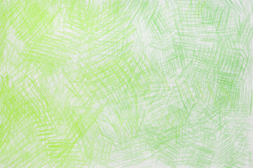 green abstract crayon drawing on white paper background texture