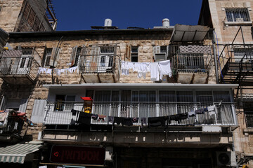 Jerusalem: laundry drying on clothes line outdoors on balcony
