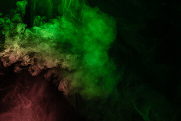 Green and pink steam on a black background.