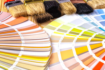 Close-up on color palette guide for printing and painting. Concept - choice of colors for design.
