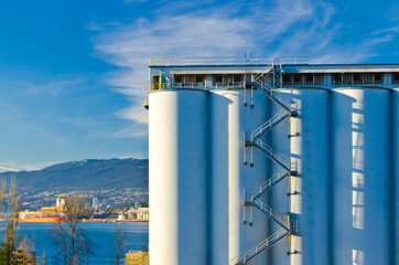 Industrial Building over fantastic blue sky and ocean view in Vancouver, Canada.