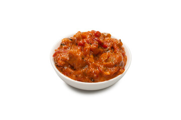 Vegetable stew in a bowl isolated on white background.