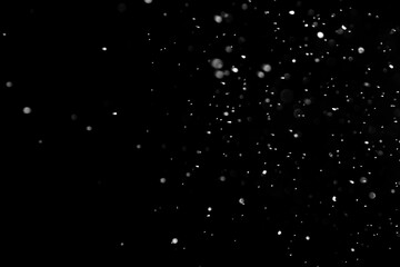 Defocused Snowing or raindrops on a dark background. Overlay