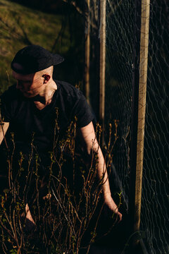 Young man gardening a sunny dat