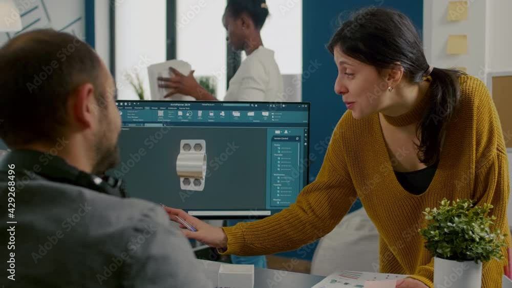 Poster industrial woman designer discussing with technician engineer working in cad program, designing 3d p