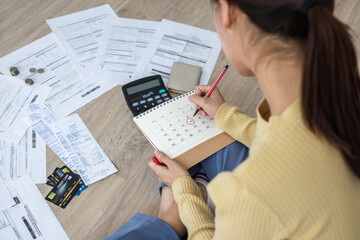 Top view owe, mortgage asian woman, female sitting on floor home, stressed calculate expense from...