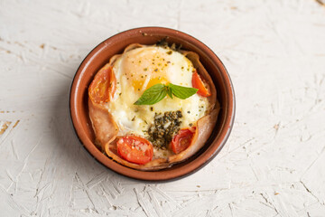 Egg Caprese Breakfast Cup, hot homemade ham, egg and caprese-flavored dish