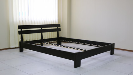 frame of a double wooden bed