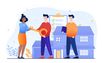 Male real estate agent gives a giant key to buyers