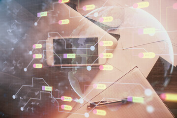 Double exposure of technology theme drawing over work table desktop. Top view. Global data analysis concept.