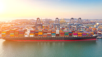 Container , container ship in export and import business and logistics. Shipping cargo to harbor by...