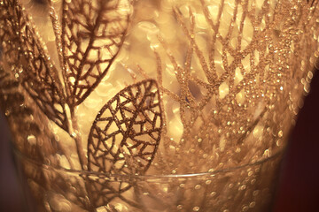 Shiny golden leaves with glitter. Christmas decoraitons