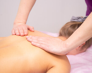 Obraz na płótnie Canvas Massage closeup, cosmetologist procedure, acupressure. Backrub close up