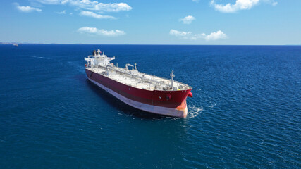 Aerial photo of industrial crude oil - fuel tanker ship cruising deep blue Mediterranean sea