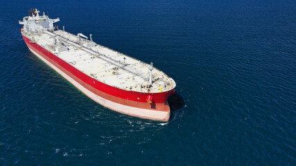 Aerial photo of industrial crude oil - fuel tanker ship cruising deep blue Mediterranean sea