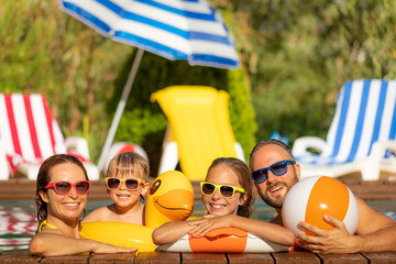 Happy family having fun on summer vacation