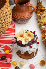 Easter cakes on a white wooden table.
