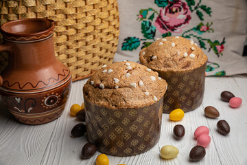 Easter cakes on a white wooden table.
