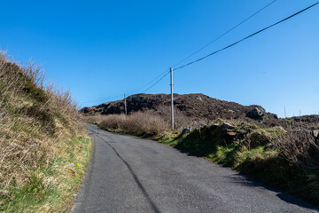Utility Pole and lines for transmission of electricity and communication to dwellings in rural...
