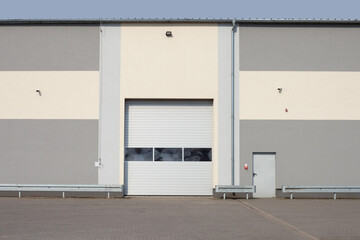 Rolling gate or roller shutter used for factory, warehouse or hangar.