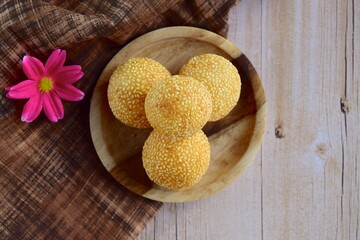 Sesame seed balls or Onde-onde. Indonesian traditional street food. glutinous rice flour stuffed with mung bean paste coated with sesame seeds