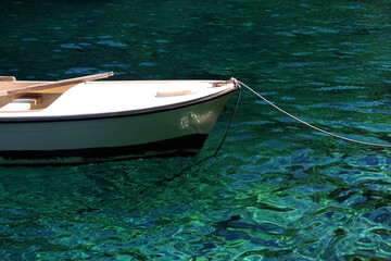 Small boat and beautiful clear sea on island Lastovo, Croatia.
