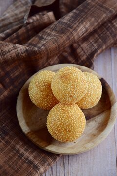 Sesame seed balls or Onde-onde. Indonesian traditional street food. glutinous rice flour stuffed with mung bean paste coated with sesame seeds