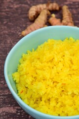 Nasi Kuning or Turmeric rice. Indonesian food 