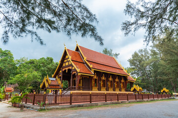 Ubosot  (ordination hall) made from teakwood in Tesdhammanava temple.