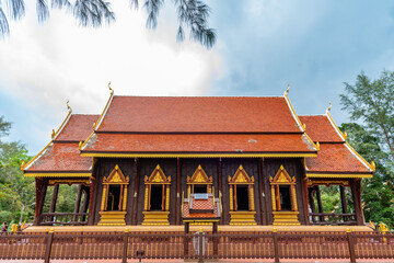 Ubosot  (ordination hall) made from teakwood in Tesdhammanava temple.