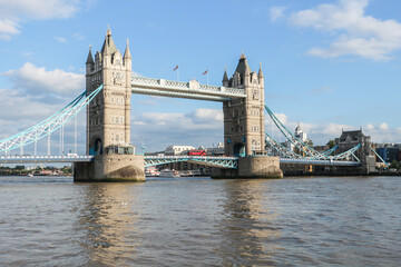 One of the most popular London city architectural attractions, the Tower Bridge crossing Thames river