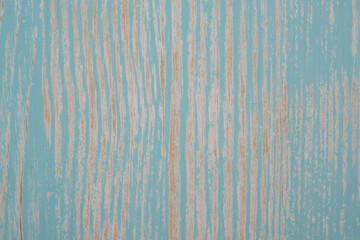 Wooden board painted with blue paint shabby texture