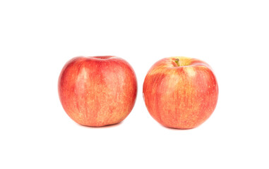 Two red ripe apples isolated on a white background.