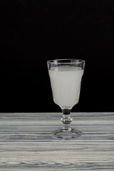 Raki - Turkish or Greek alcoholic drink, distilled from grapes and flavored with anise, when mixed with water becomes milky white