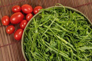 raw cabbage leaf cut and ready to sauté