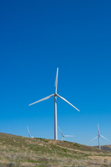 Wind Turbines Above Ridge Line