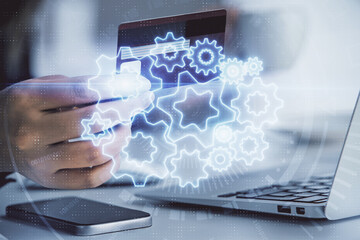 Multi exposure of woman on-line shopping holding a credit card and financial theme drawing. Business E-commerce concept.