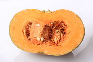 Fresh Half Sliced Pumpkin (Labu Kuning or Kabocha Squash) Isolated on White Background