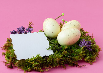 In this picture there is a beautiful Easter atmosphere on it there is a card with which you can write a happy Easter.