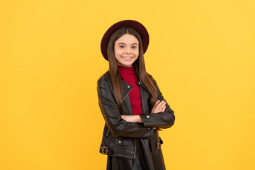 back to school. tween fashion look. childhood happiness. happy girl in leather wear
