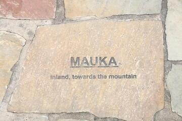 Hawaiian tiles embedded in the sidewalk of Kalakaua Avenue in Waikiki 