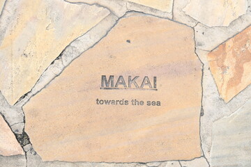 Hawaiian tiles embedded in the sidewalk of Kalakaua Avenue in Waikiki 