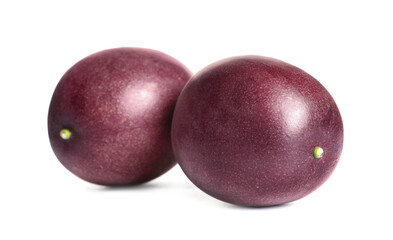 Delicious ripe passion fruits on white background