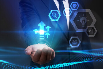 Business, Technology, Internet and network concept. Young businessman working on a virtual screen of the future and sees the inscription: