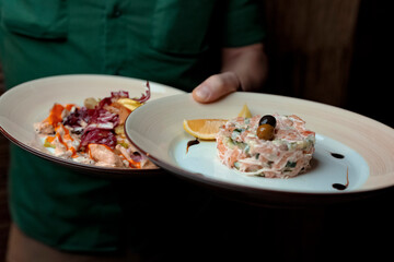 person with a plate of food