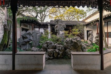 Fototapeta na wymiar Landscape, window and door architecture, old building structure in Lingering Garden, a classical Chinese garden in Suzhou, China